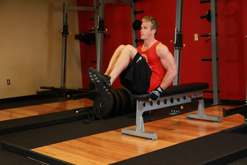 Seated Flat Bench Leg Pull-In: end position