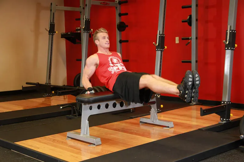 Seated Leg Tucks: end position