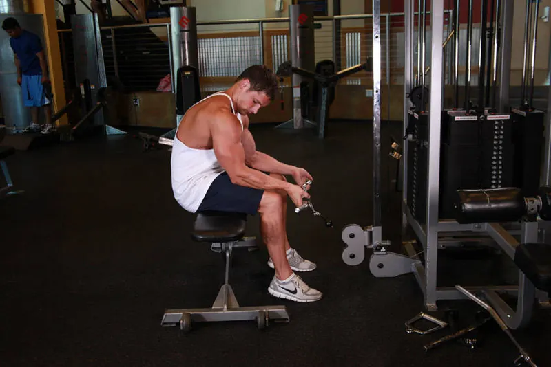 Seated Two-Arm Palms-Up Low-Pulley Wrist Curl: starting position