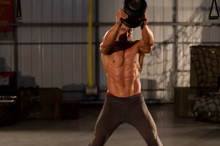 Single Dumbbell Raise: end position