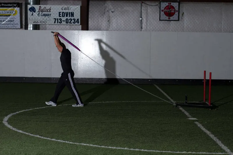 Sled Overhead Triceps Extension: end position
