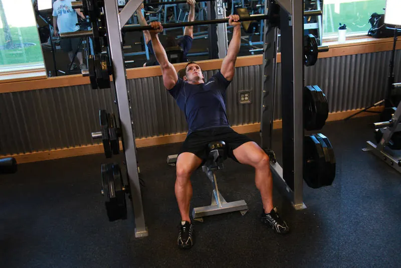 Smith Incline Shoulder Raise: end position