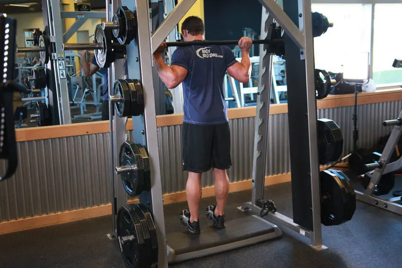 Smith Machine Reverse Calf Raises: starting position