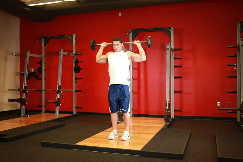 Standing Barbell Press Behind Neck: starting position