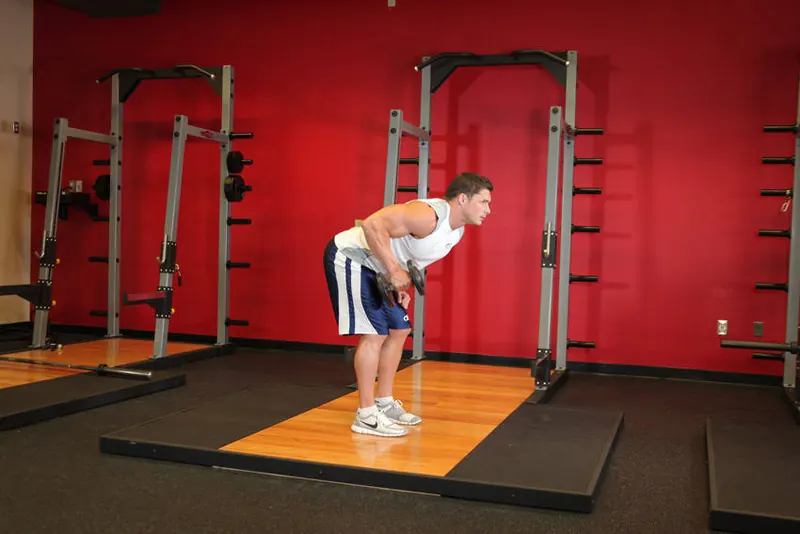 Standing Bent-Over One-Arm Dumbbell Triceps Extension: starting position