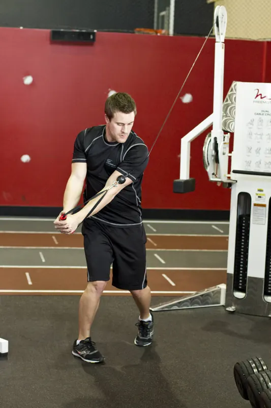 Standing Cable Wood Chop: end position