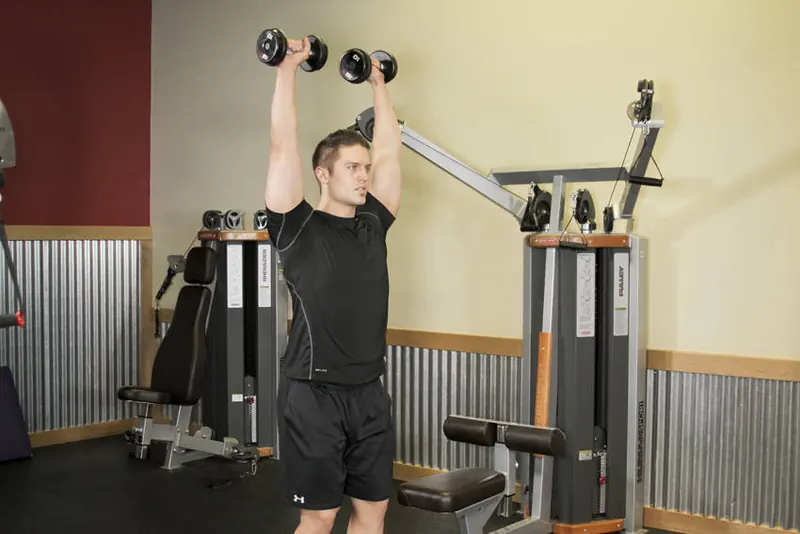 Standing Dumbbell Press: end position