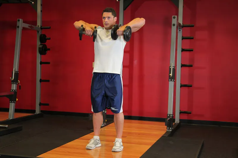 Standing Dumbbell Upright Row: starting position
