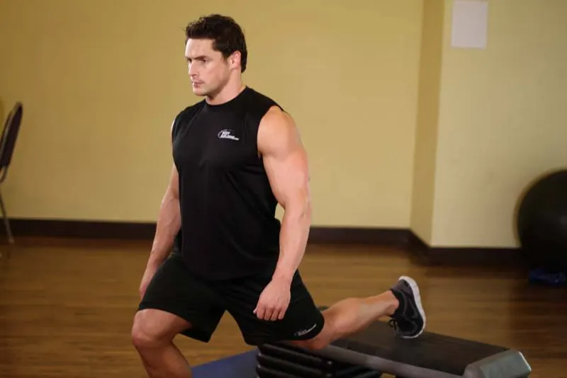 Standing Elevated Quad Stretch: end position