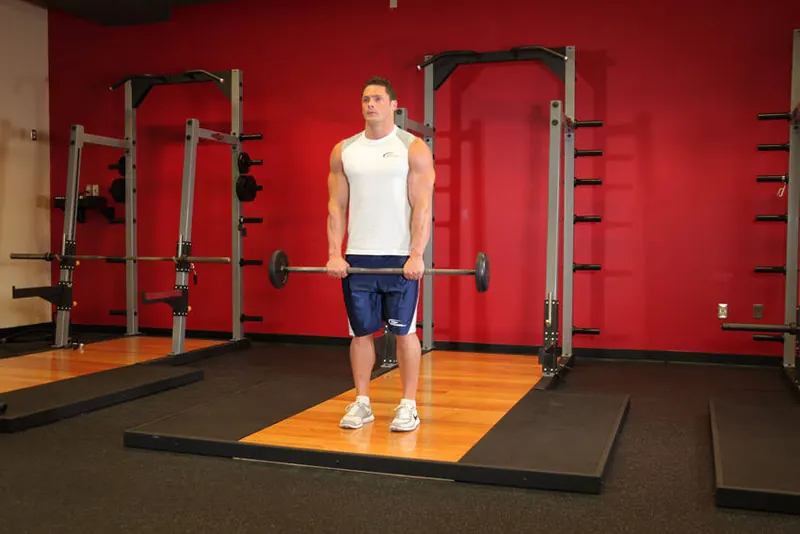 Standing Front Barbell Raise Over Head: starting position