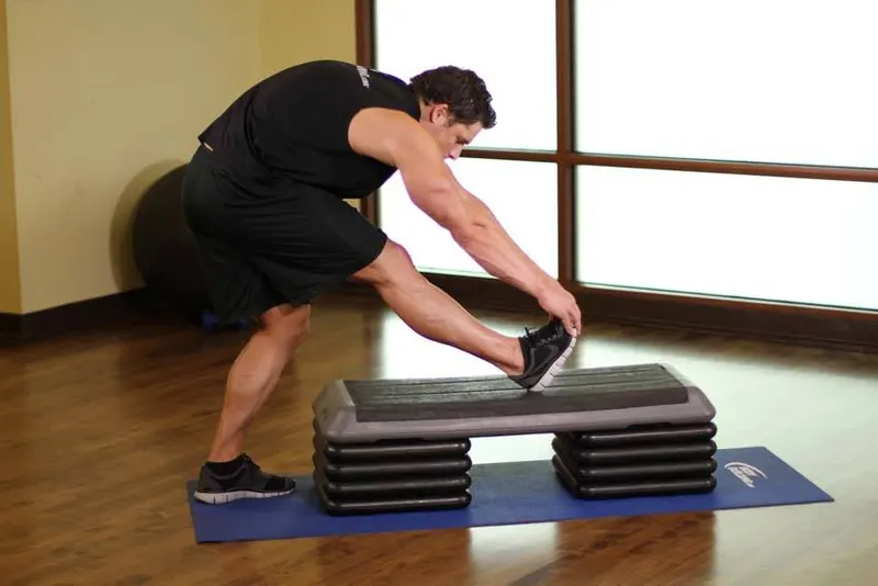 Standing Gastrocnemius Calf Stretch: end position
