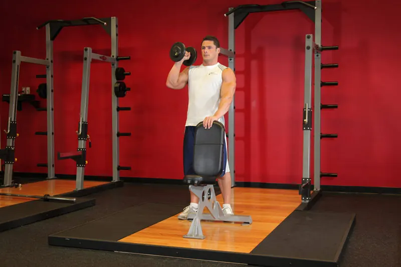 Standing Palm-In One-Arm Dumbbell Press: starting position