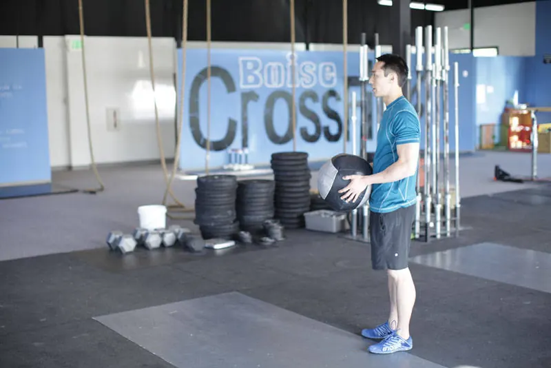 Standing Two-Arm Overhead Throw: starting position