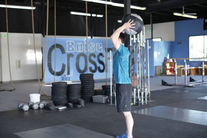 Standing Two-Arm Overhead Throw: end position