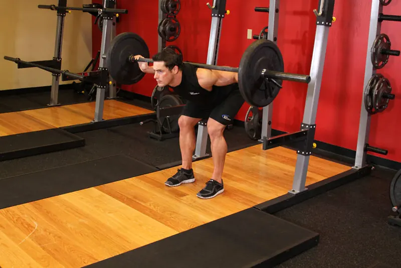 Stiff Leg Barbell Good Morning: end position