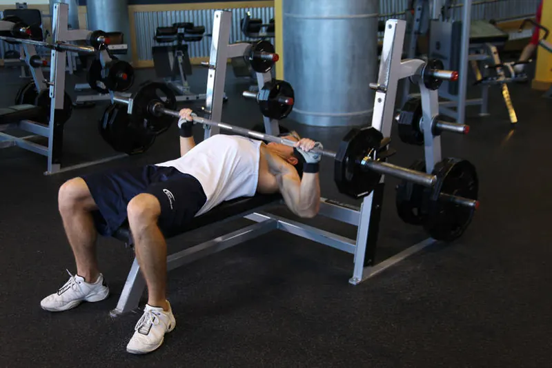 Wide-Grip Barbell Bench Press: end position