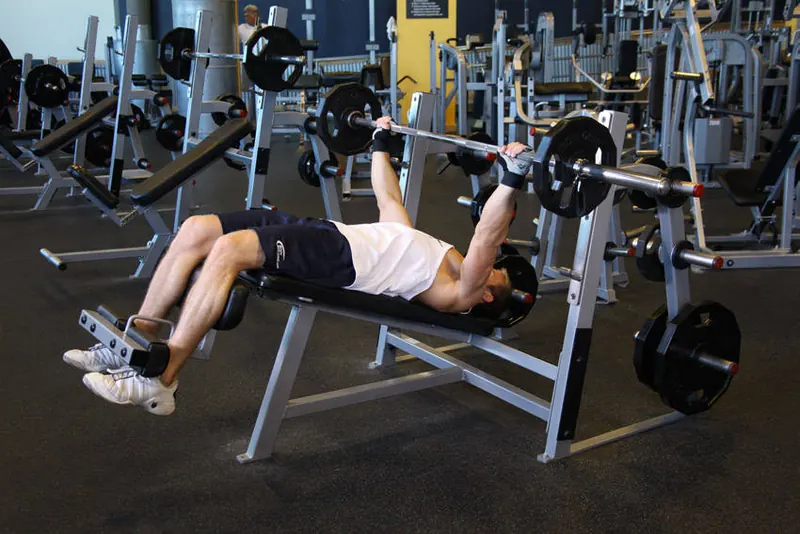Wide-Grip Decline Barbell Bench Press: starting position