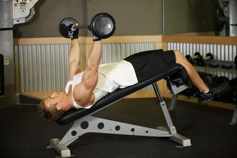 Wide-Grip Decline Barbell Pullover: starting position